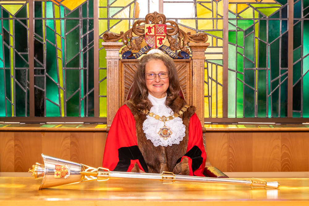 Picture shows Cllr Morales sat in the council chamber in her Mayoral robes.