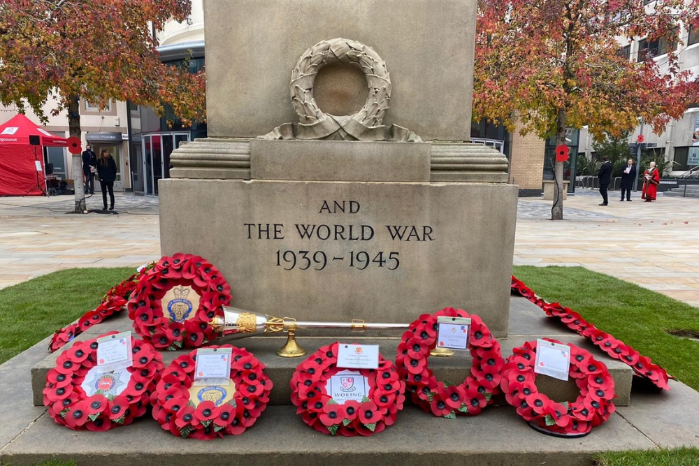 Wreaths laid at base of the War Memorial in Woking town centre