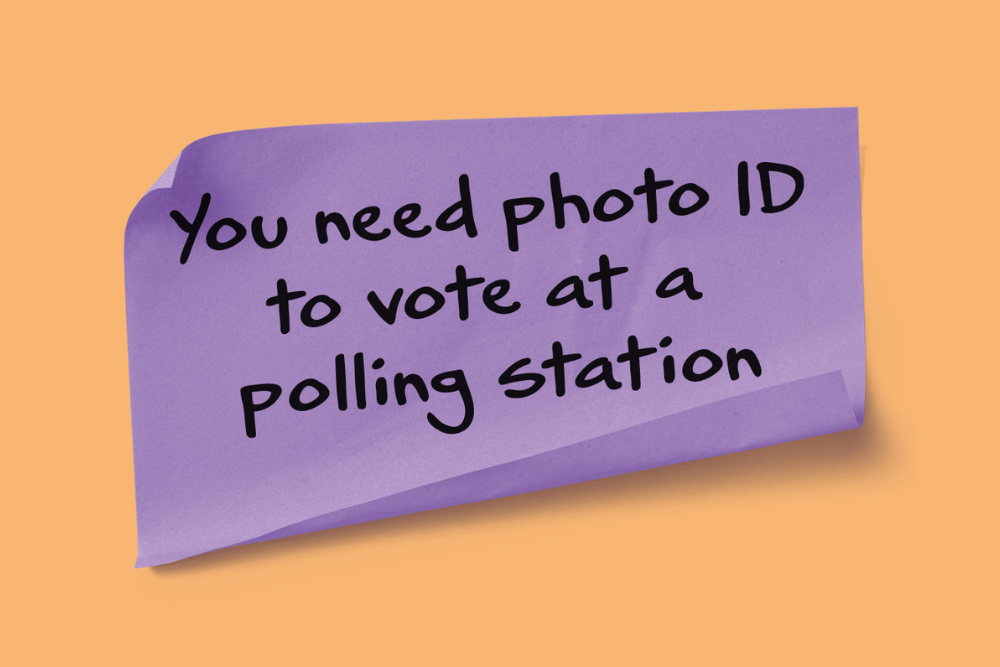 Illustrated purple post-it note with handwritten text stating: 'You need photo ID to vote at a polling station'