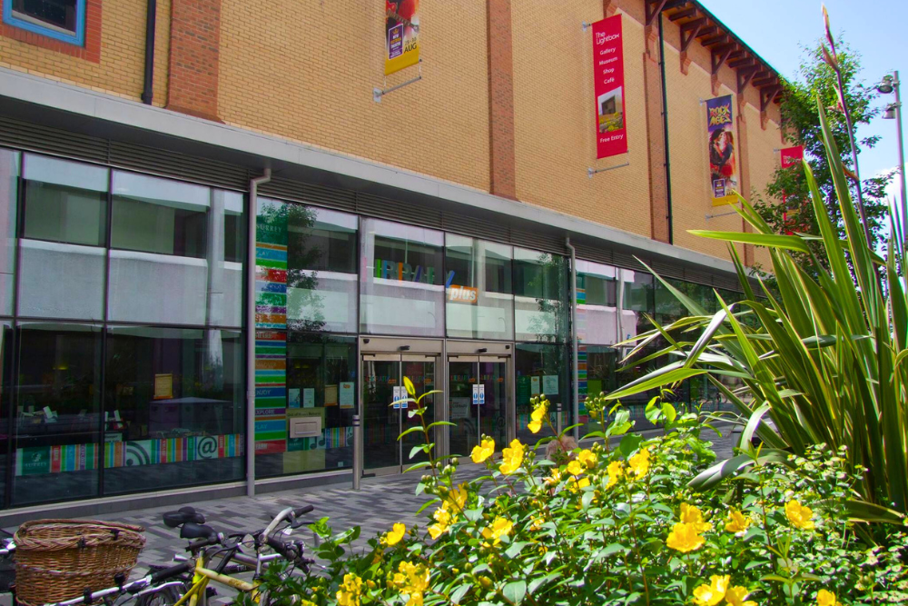 Exterior of Woking Library and flower beds