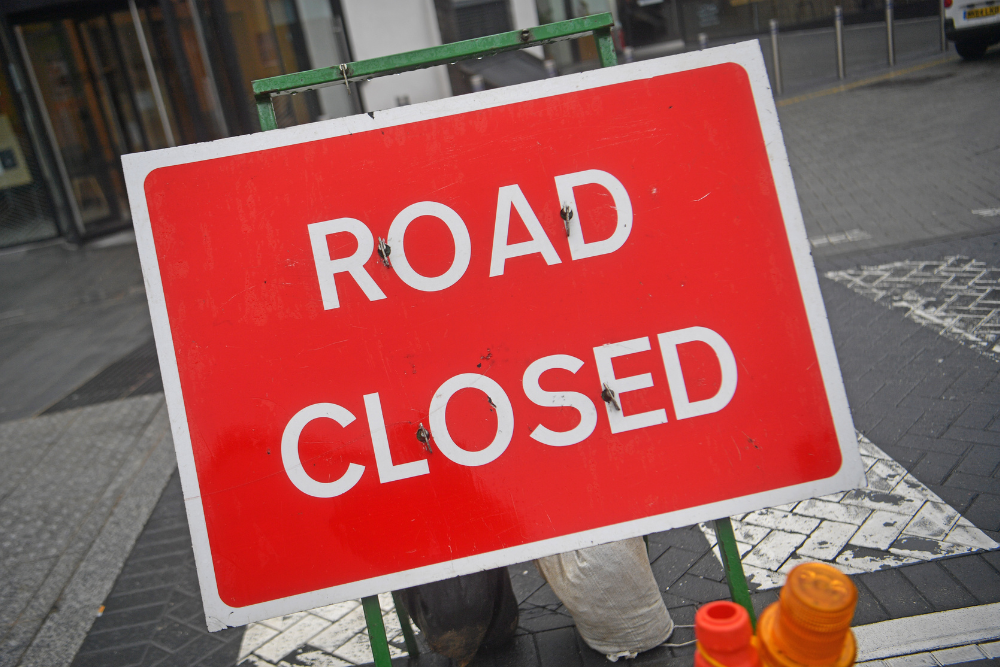 Road closed highway sign